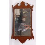 A late 19th century mahogany fret carved wall mirror, in the Chippendale style, h.121cm, w.66cm