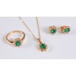 An 18ct emerald and diamond suite, comprising of a ring, necklace and matching earstuds, each as a