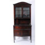 A circa 1900 Sheraton Revival mahogany and marquetry inlaid cabinet, the upper section having twin