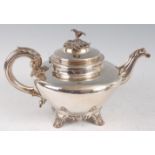 A George IV silver teapot, of squat circular form, the hinged cover with cast leaf finial, having