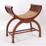 An Edwardian mahogany boxwood strung and satinwood X-framed stool, having embroidered seat,