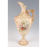 A large Royal Worcester blush ivory ewer, the frieze decorated with cherubs and grotesque masks, the