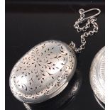 A Victorian silver pomander, of pierced oval form, the hinged lid revealing gilt washed interior, on