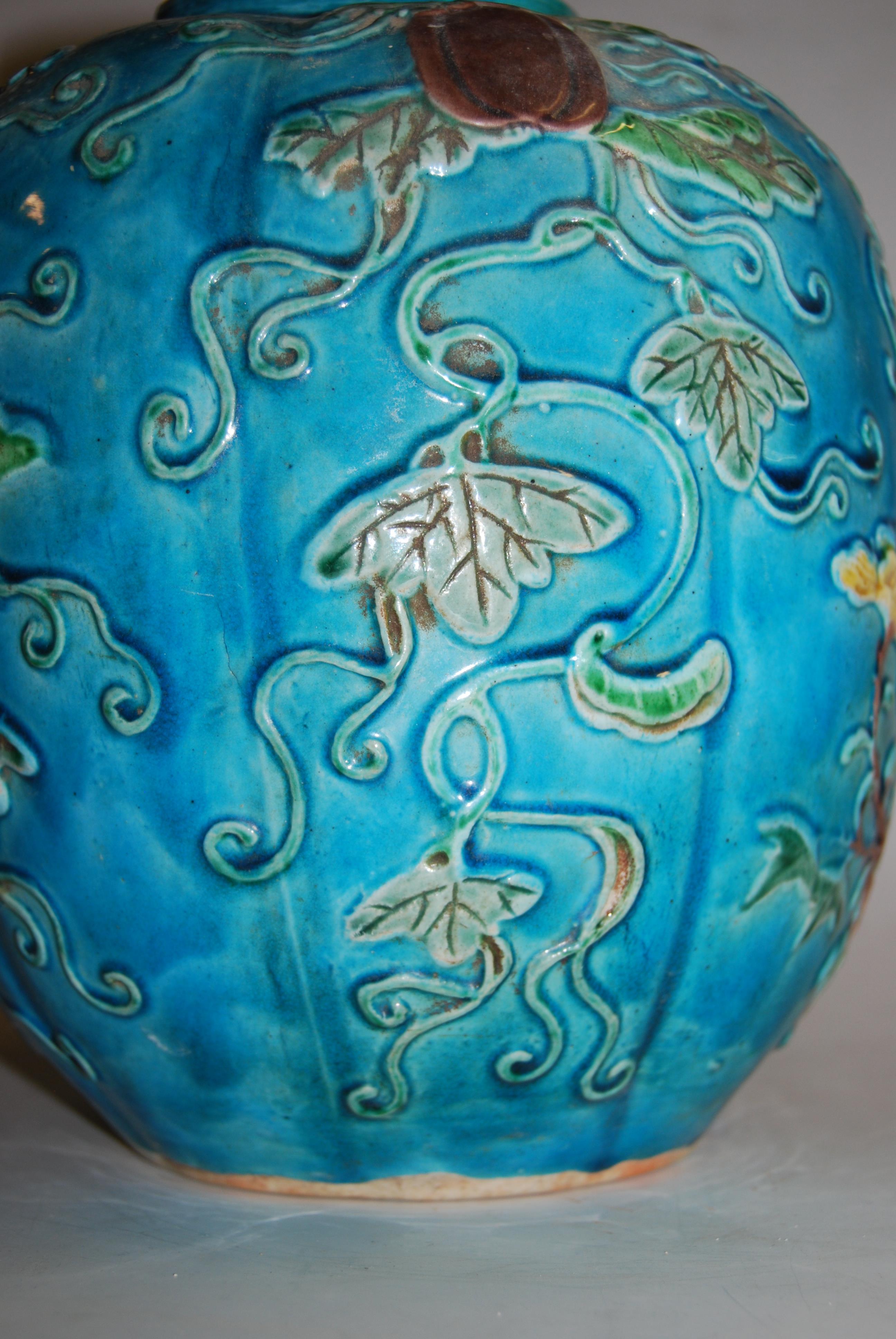 A 19th century Chinese ginger jar and cover, the turquoise ground applied with trailing flowers, - Image 11 of 19