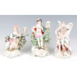 A Derby porcelain bocage candle-holder figure of a female musician with attendant sheep, decorated