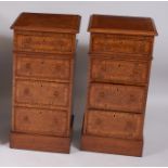 A pair of contemporary burr oak and rosewood crossbanded bedside chests, each fitted with four short