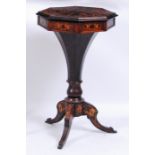 A Victorian rosewood pedestal needlework table, of octagonal form, having marquetry inlaid hinged