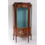 A Vernis Martin style mahogany and gilt metal mounted vitrine, of serpentine outline, the glazed