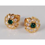 A pair of 22ct gold, synthetic emerald and colourless sapphire circular cluster earrings, the