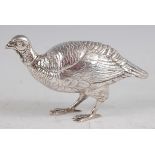 A silver grouse, with detachable head and naturalistically p osed, 4oz, head stamp 925, 12cm