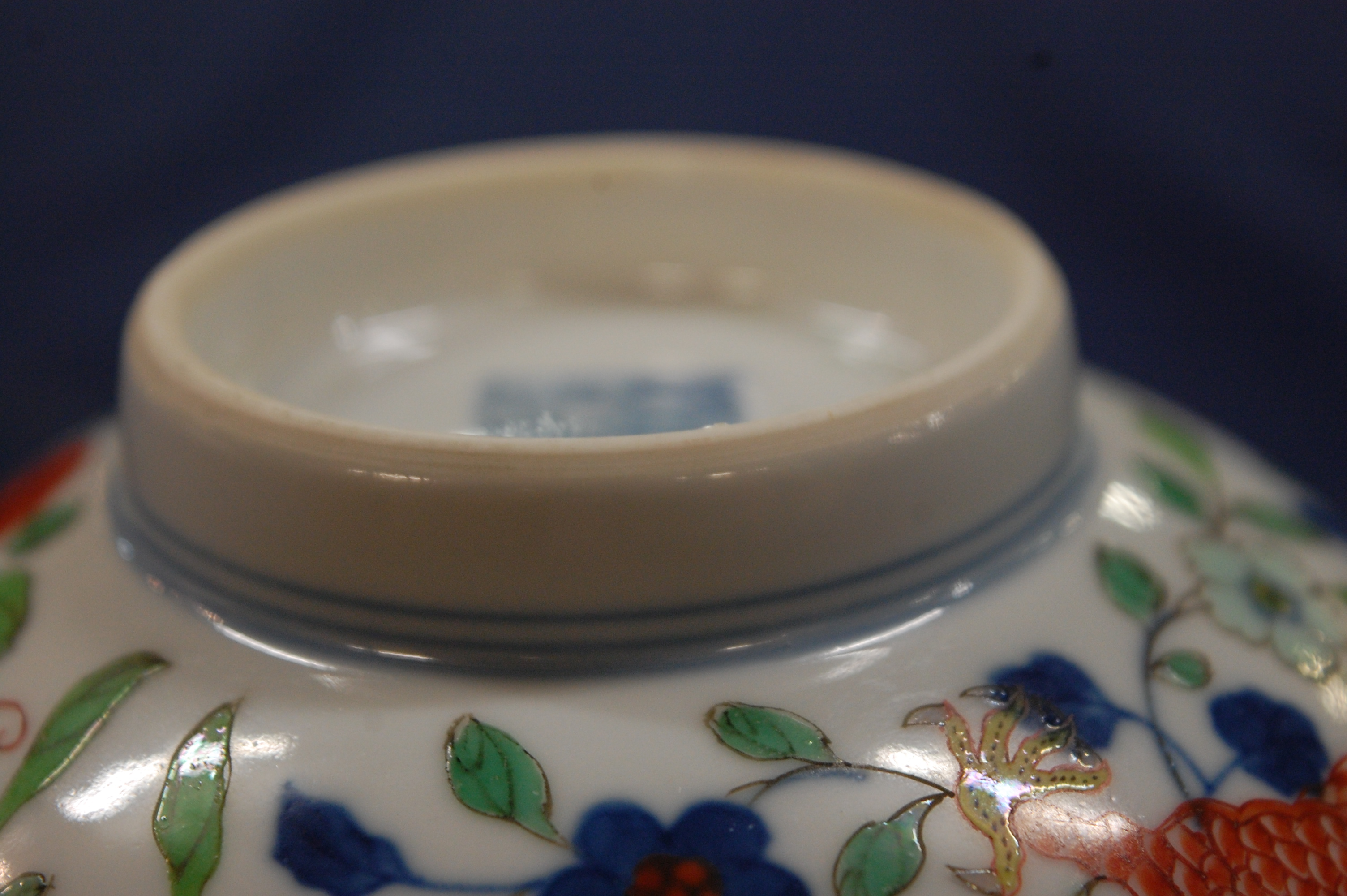 A Chinese porcelain bowl , the interior blue and white decorated with flowering rockwork and - Image 37 of 37