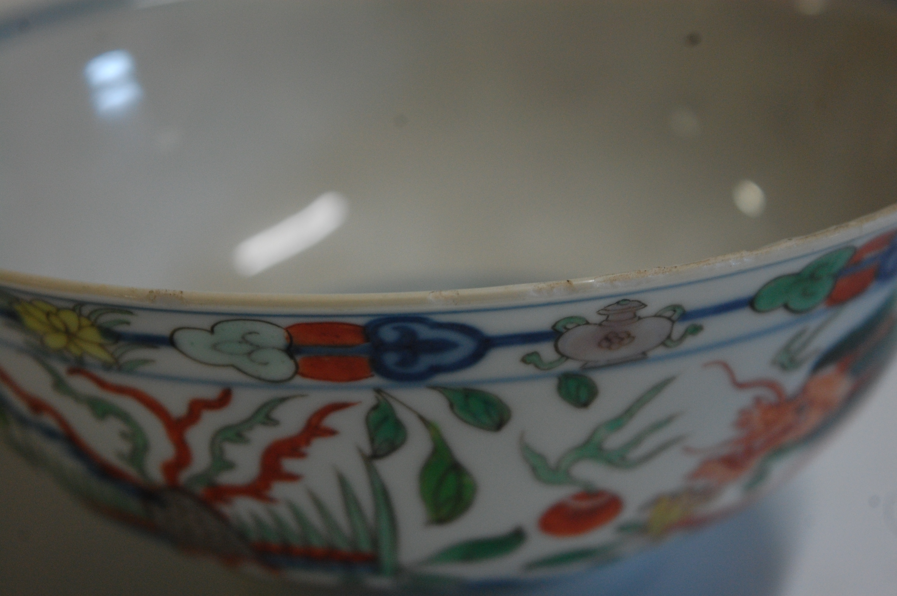 A Chinese porcelain bowl , the interior blue and white decorated with flowering rockwork and - Image 9 of 37