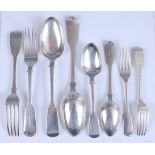 A George III and later silver harlequin part cutlery suite, comprising nine tablespoons, twelve