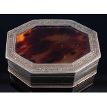A 19th century French silver gilt and tortoiseshell snuff box, of octagonal form, the hinged lid
