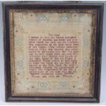 An early George III needlework sampler depicting The Apostles Creed verse, within floral border,