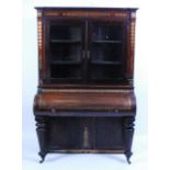 An early Victorian walnut and brass inlaid bureau cabinet by John Broadwood & Sons of London, the
