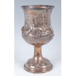 A mid-Victorian silver pedestal oversize goblet, the whole having a plain cartouche within an