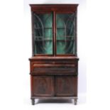 A William IV mahogany secretaire bookcase, the upper section having twin astragal glazed doors