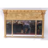 A mid-19th century giltwood and gesso chimney mirror, having a ball applied cornice, the frieze