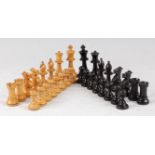 A 20th century turned boxwood and ebony chess set in the Staunton pattern, king h.8cm