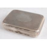 A Victorian silver box, of rounded rectangular form, having engine turned decoration and monogrammed