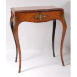 A mid-19th century French kingwood and crossbanded needlework table, of serpentine outline, the