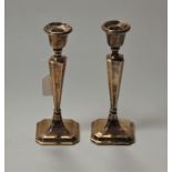 A pair of 20th century silver candlesticks, Birmingham 1947, h.23cm, loaded