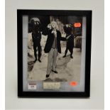 A framed black and white photograph of William Hartnell as Dr Who with signed paper beneath