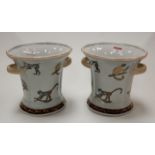 A pair of reproduction stoneware twin handled vases, height 18cm