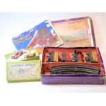 A boxed Hornby clockwork train 'Mo' passenger set; together with a boxed Britains Home Farm series