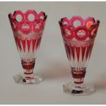 A pair of Bohemian ruby overlay vases of tapering conical form to octagonal bases, height 23cm