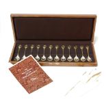 A cased set of 12 silver commemorative teaspoons as issued for the RSPB by Mappin & Webb