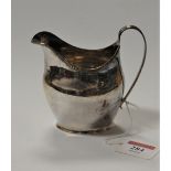A George III silver helmet shaped cream jug, hallmarked London 1804, 3.5oz