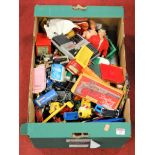 A collection of various 20th century toys to include Action Man, diecast vehicles, and games