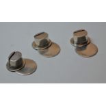 A set of three 20th century silver place setting holders, each in the form of a top-hat