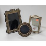 A 20th century silver photograph frame, hallmarked Birmingham 1938, 14x9cm; together with two others