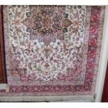 A contemporary cream ground Keshan rug, 200 x 140cm