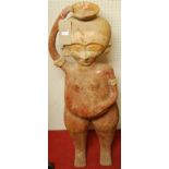 A Central American painted terracotta standing fertility figure, h.107cm