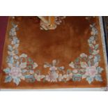 A modern Chinese Superwash brown ground rug, 190 x 91cm