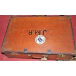 A stained ply and metal bound suitcase, monogrammed J.M.R., 42.5 x 65cm