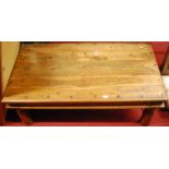 A contemporary Eastern hardwood and metal bound low rectangular coffee table, length 108.5cm