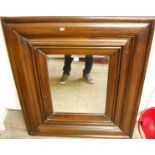 A contemporary hardwood rectangular wall mirror, having wide moulded border, 100 x 90cm