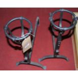 A pair of wrought andirons