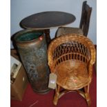 A wicker dolls chair, copper stickstand, rush seat child's chair, pedestal games table (4)