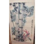 A Chinese watercolour scroll of bamboo, signed and with studio seal and with silk border, width 56cm