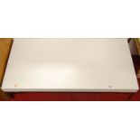 A Charles Antonio Citterio white laminate low rectangular coffee table, raised on polished aluminium