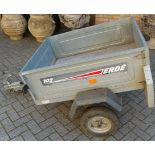 A galvanised metal Erde102 single axle two-wheel open trailer, with maximum load of 300 kilos