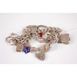 A silver curblink bracelet, with various silver and white metal charms, 78.8g