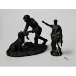 A bronze figure of a Roman senator in standing pose with arm aloft on a socle base, height 18cm,