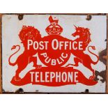 An early 20th century enamel on metal hanging double-sided advertising sign for the Post Office